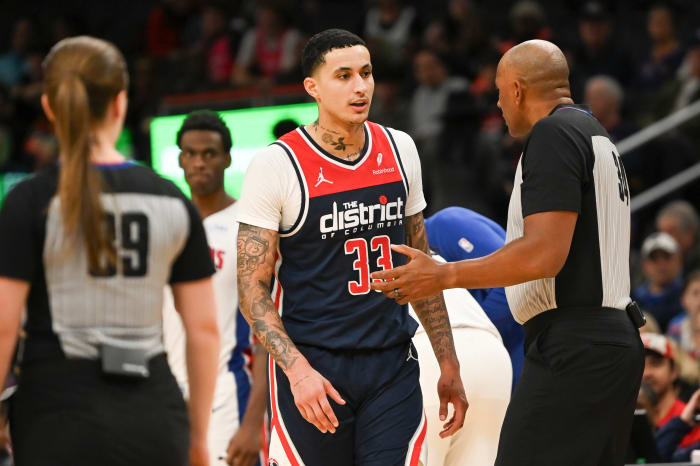 Washington Wizards forward Kyle Kuzma (33) speaks with referee Kevin Cutler (34) after being ejected during the second half against the Detroit Piston at Capital One Arena. Mandatory Credit: Tommy Gilligan-USA TODAY Sports